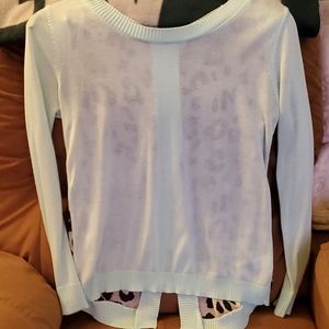 Sheer sweater with leopard pattern on back